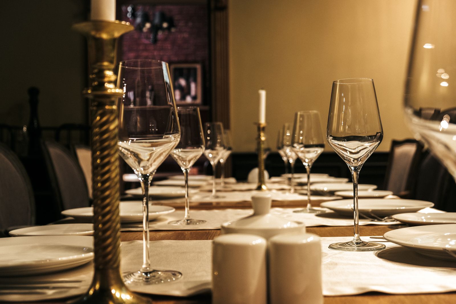 Private dining table laid for a group, of the kind arranged through independent catering providers